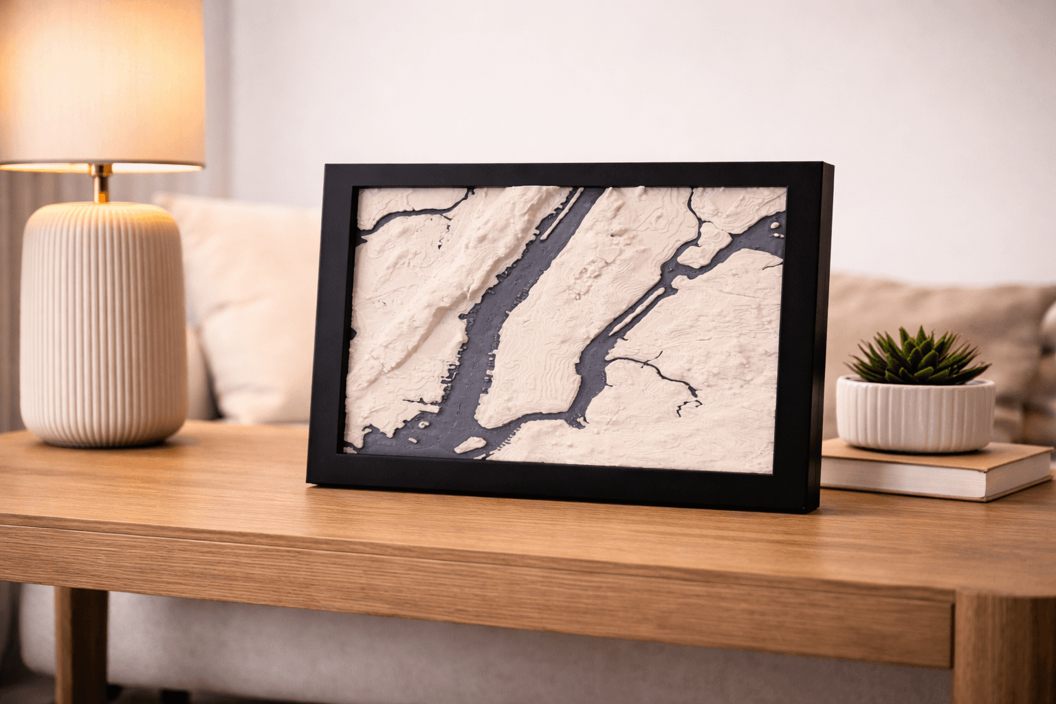 A framed map of a hometown on a shelf — placeholder for lifestyle photography